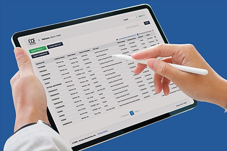 A person using Omega's laboratory testing solutions on a tablet
